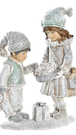 Winterkinder mit Süßigkeitenkorb